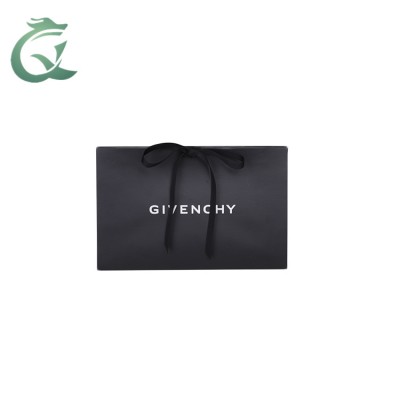 Foldable luxurious paper bag black silver stamp